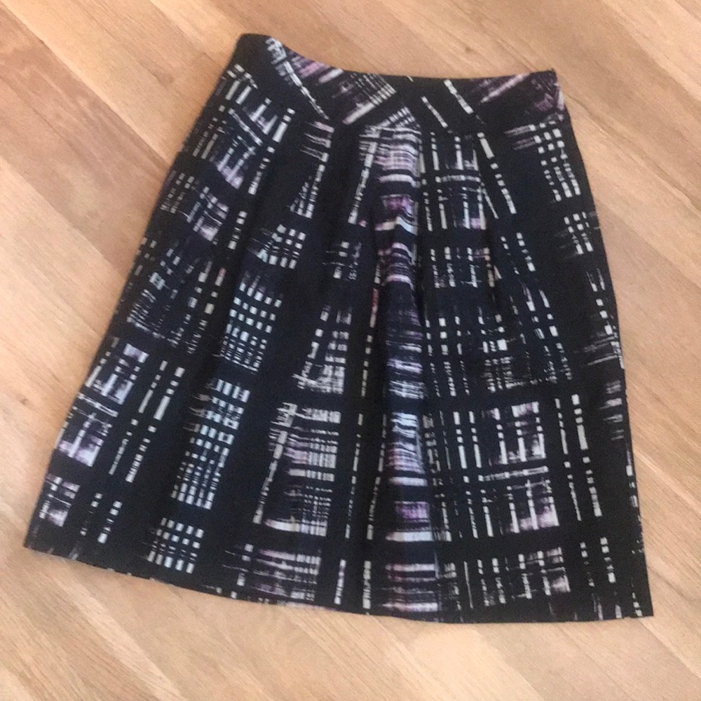 Blk, White, purple skirt